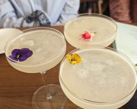 Bread with butter, martini glasses, and fish crudo at Modern Bird in Traverse City, Michigan.