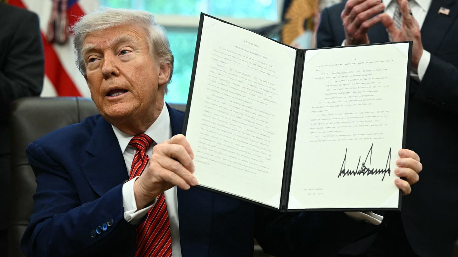 US President Donald Trump signs executive orders in the Oval Office of the White House in Washington, DC, on May 23, 2025. (Photo by Mandel NGAN / AFP) (Photo by MANDEL NGAN/AFP via Getty Images)          