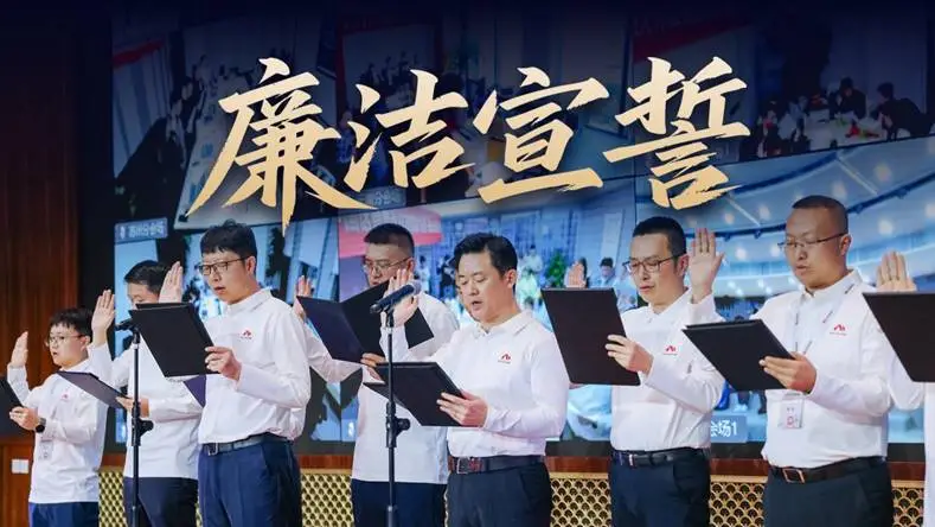 Group of men in white shirts taking oath with raised hands, holding documents.
