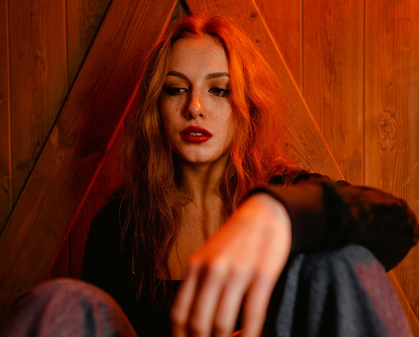 Thin young woman looking sad