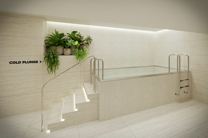The sleek, modern interior of the newly renovated Virgin Active Spa in Mayfair, featuring warm ambient lighting, clean architectural lines, and luxury stone finishes.