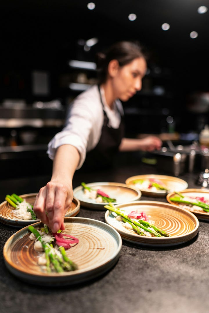 Kid looking in the fridge. Chef plating veggies. Photos by Igor Rodrigues and John Forander via Unsplash.