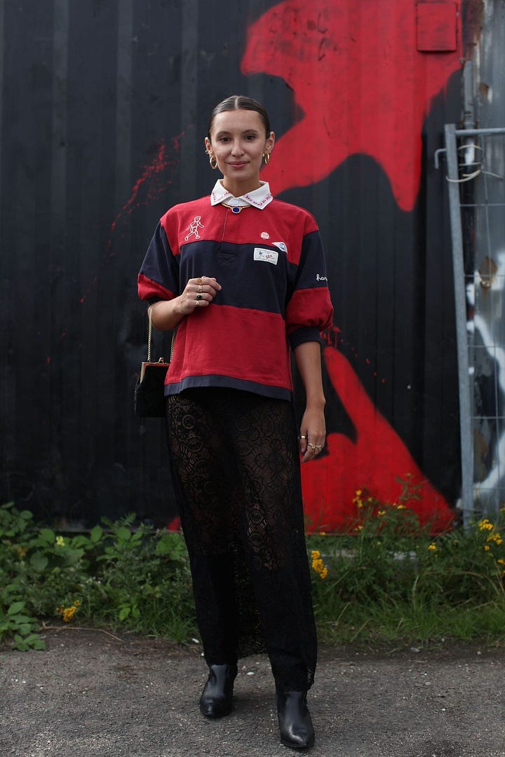 People in rugby tops with long skirts