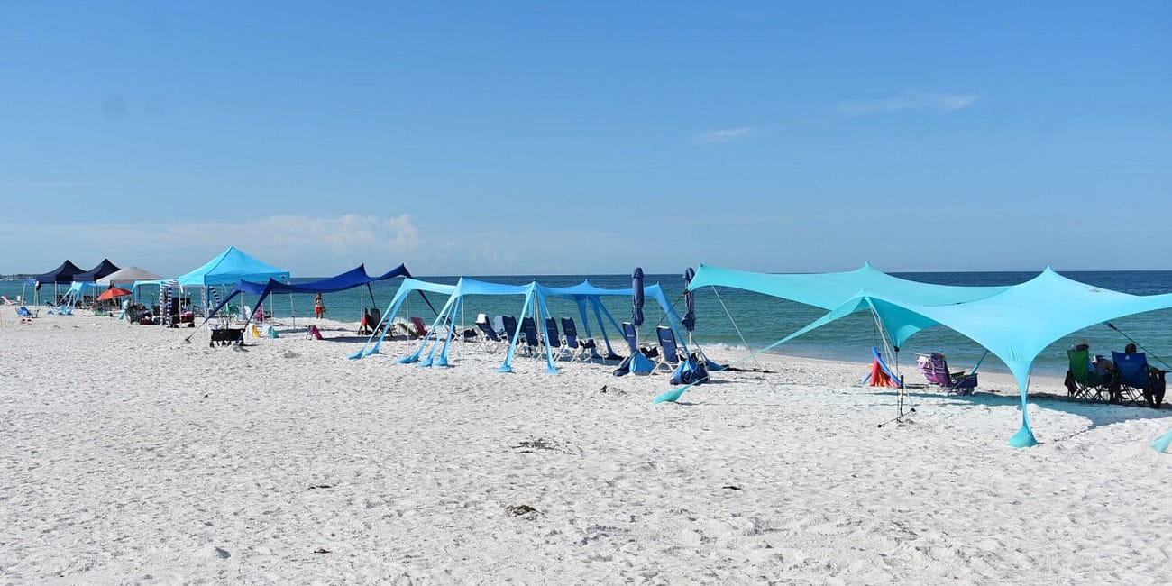 Holmes Beach Mayor Raises Concerns Over Commercial Cabana Rentals on Public Beaches