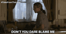 a woman in a kitchen with the words " don 't you dare blame me " above her