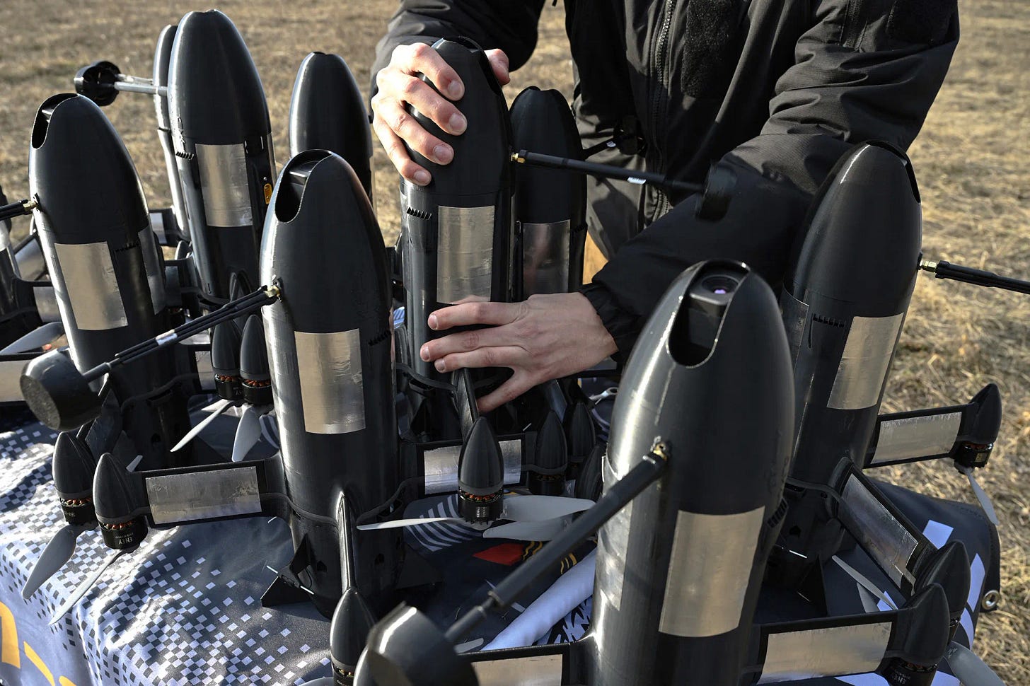 A&nbsp;SkyFall worker&nbsp;checks&nbsp;P1-Sun interceptor drones before a test flight at an undisclosed location in Ukraine on March 19.