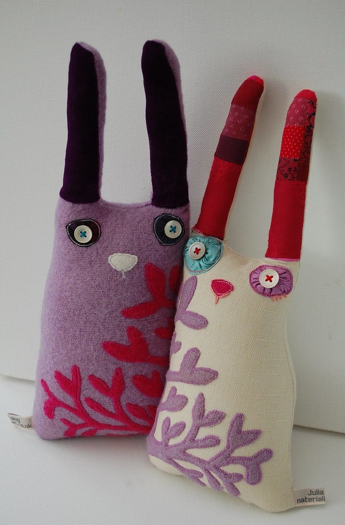 Two handmade rabbit creatures made by Julia Laing