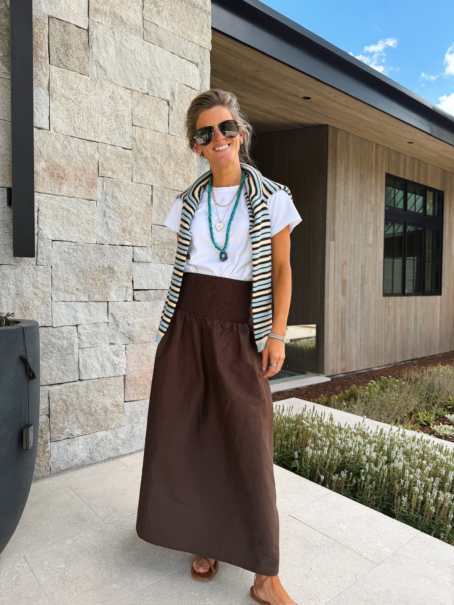 brighton butler aspen outfit margot white tee brown smocked skirt and baublebar long turquoise necklace margeaux strappy sandals