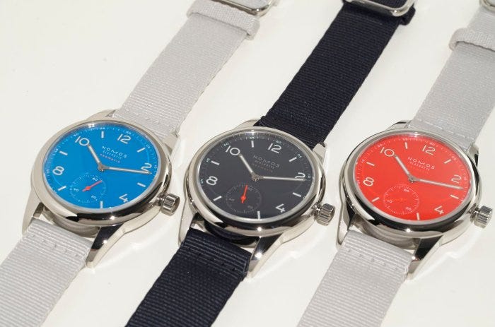 Nomos Club Neomatik in signalblau, Atlantik, and signalrot Nomos Club Neomatik in signalblau, Atlantik, and signalrot