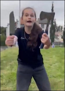A child holding an ax

AI-generated content may be incorrect.