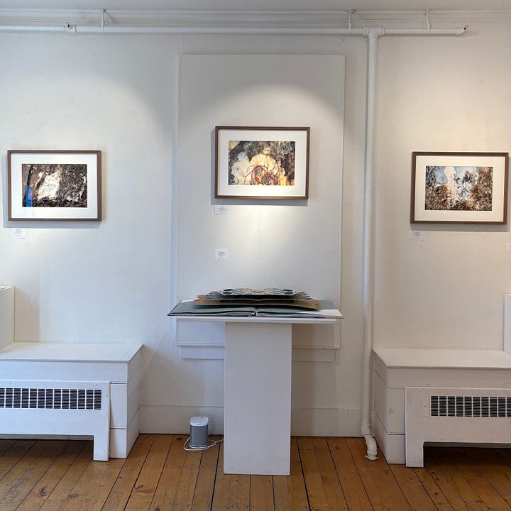 Diptych: Three images on a wall in a gallery; Two hands hold two pieces of paper to see if it's a 'match.' 