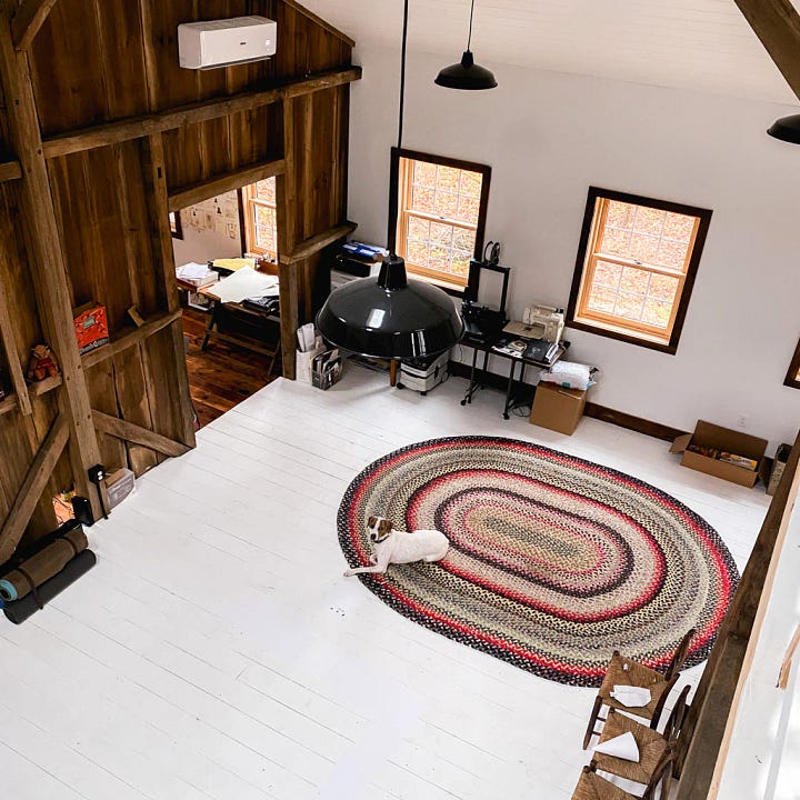 An above view of our dog Pearl laying on a colorful braided rug, and an image of Walter painting the the floor white with Soren walking down the new spiral staircase.