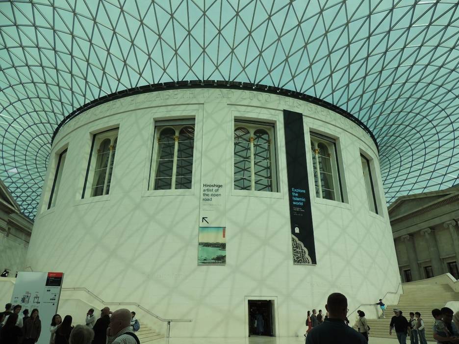 A group of people walking in British Museum

AI-generated content may be incorrect.