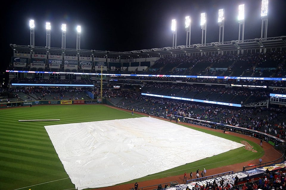 File:The tarp is on the field during the 10th inning of World Series Game 7. (30746055085).jpg