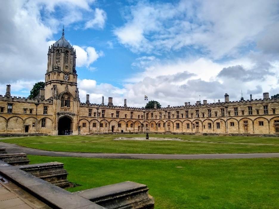 A large building with a lawn and a tower
AI-generated content may be incorrect. A large building with a lawn and a tower
AI-generated content may be incorrect.