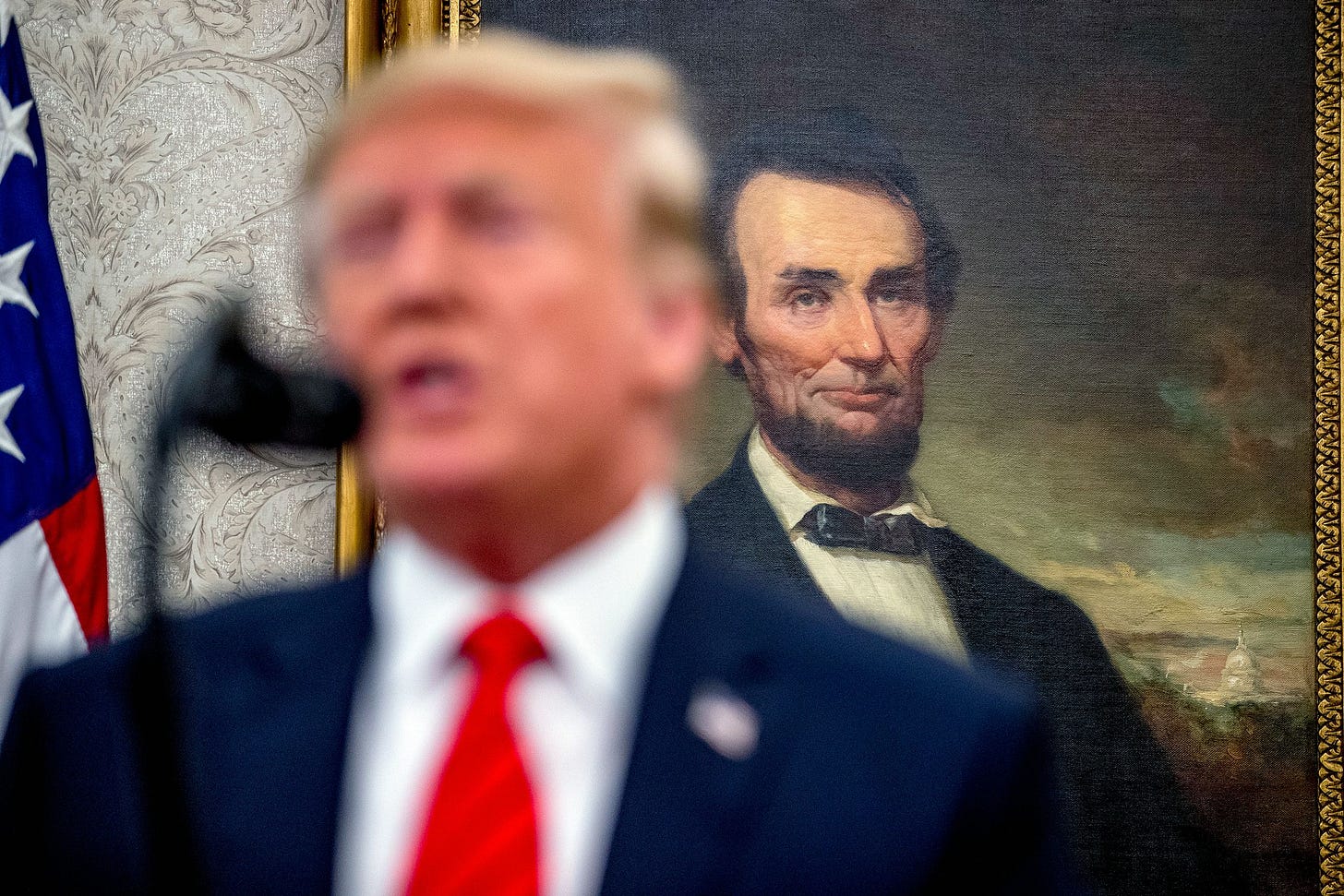 A painting of President Abraham Lincoln is seen behind President Donald Trump.