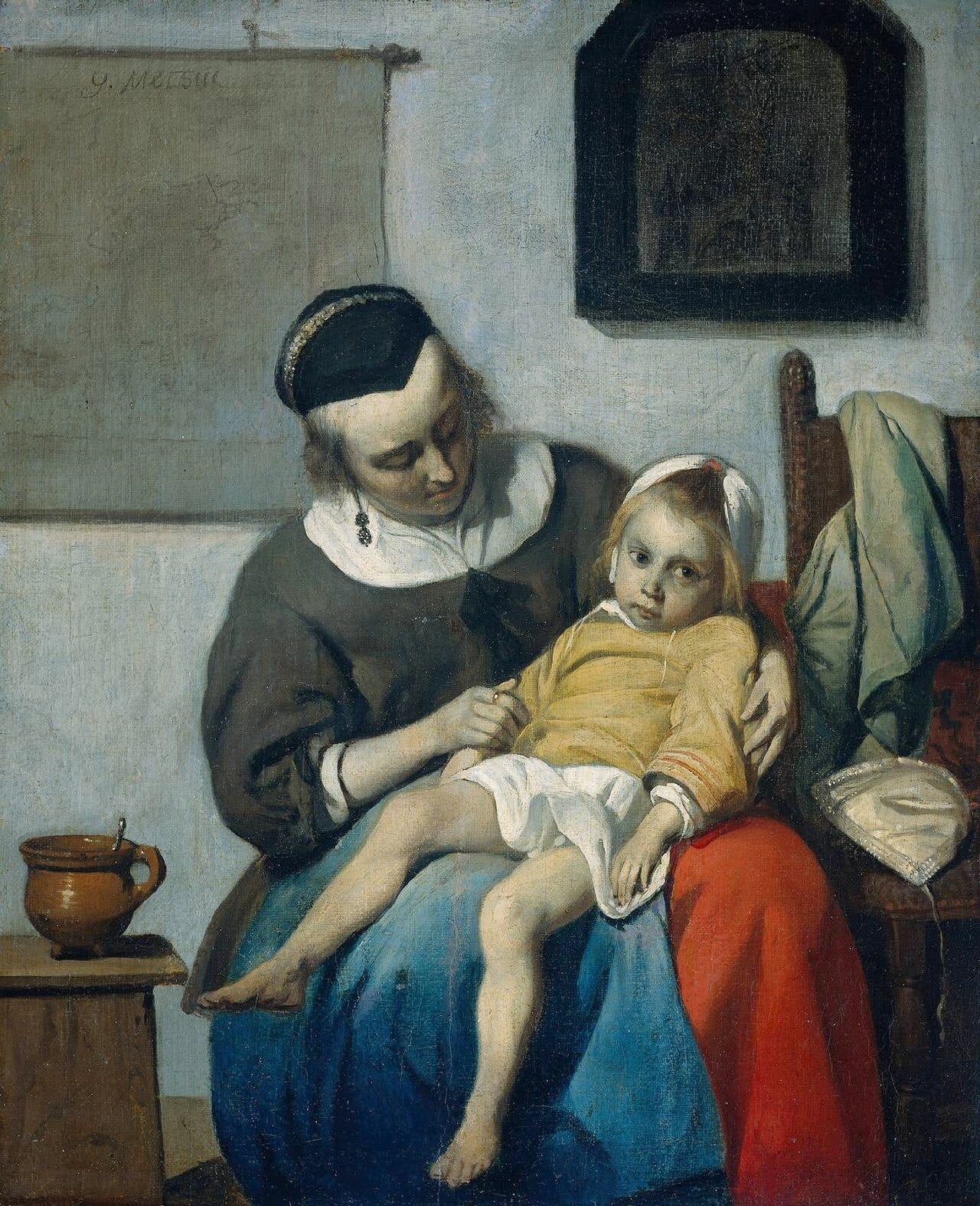 Sick child on lap