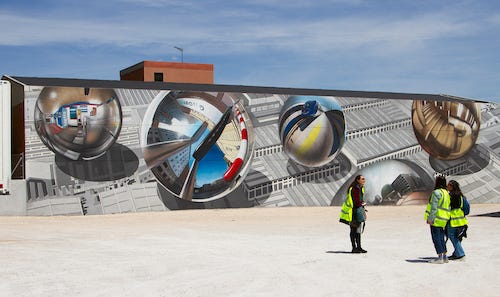 street art mural depicting spheres in Madrid street art mural depicting spheres in Madrid