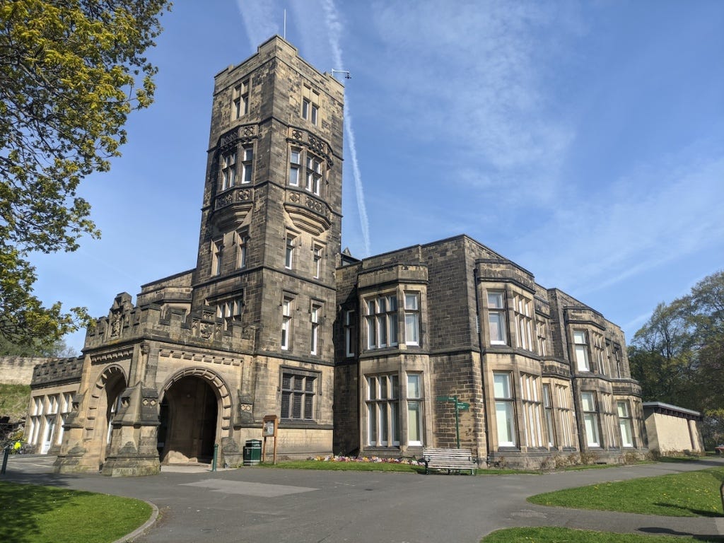 Cliffe Castle, an old hall with crenellations.