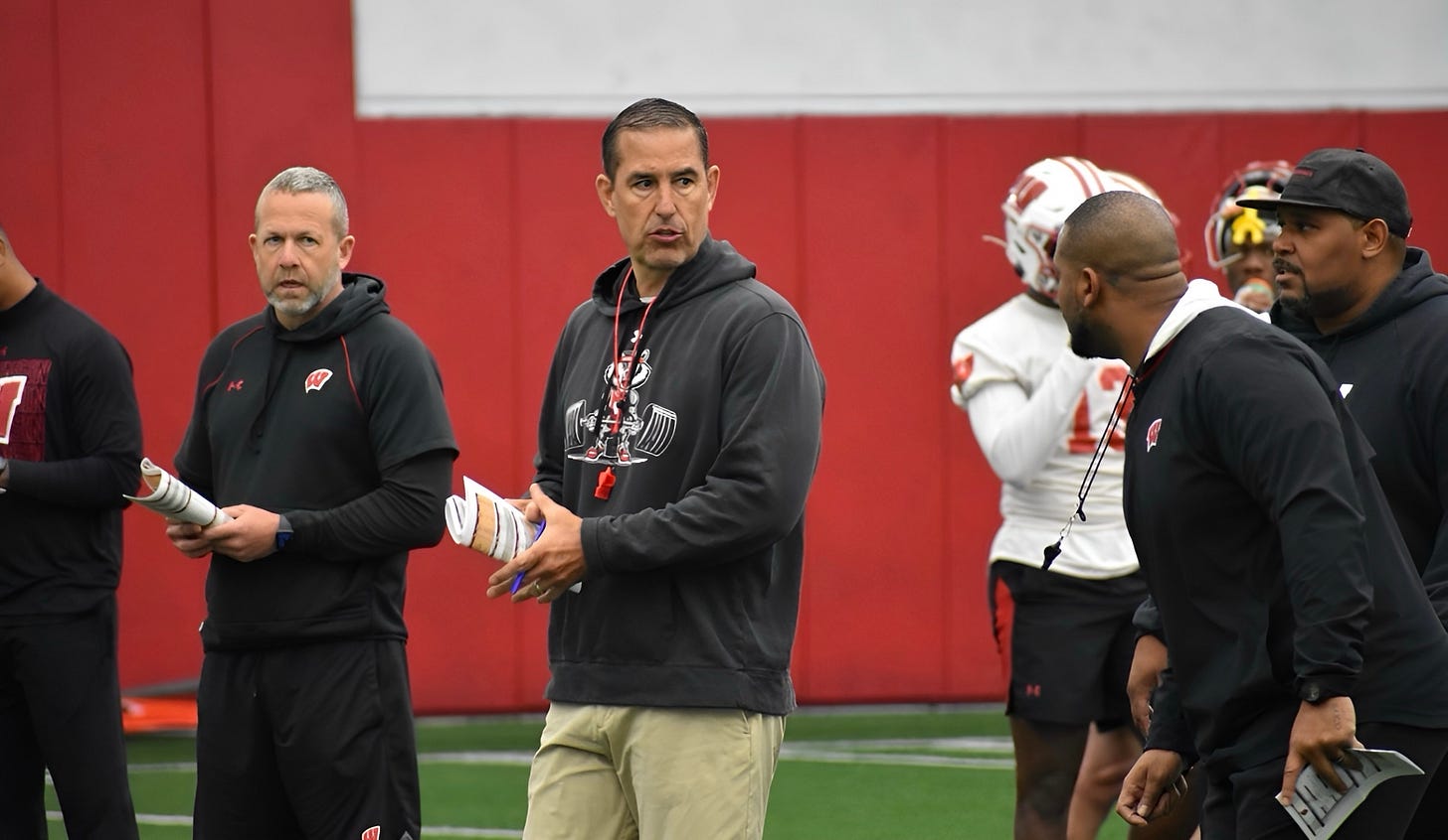 Wisconsin Badgers head coach Luke Fickell watches practice during an indoor spring football session.