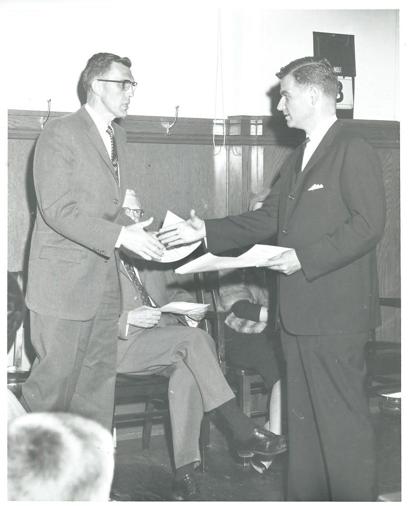 Mark Hatfield shaking hand of Judge Winston Bradshaw Mark Hatfield shaking hand of Judge Winston Bradshaw
