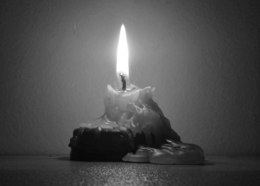 lighted candle lighted candle