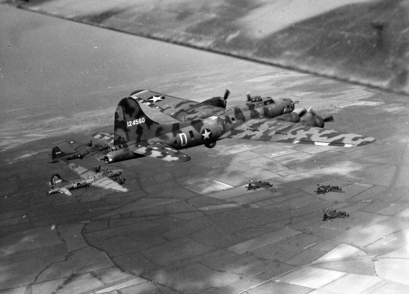Boeing B-17F Fortress “Little Audrey” sporting a unique camouflage paint scheme flying with the 306th Bomb Group from Thurleigh, Bedfordshire, England, 1943. Boeing B-17F Fortress “Little Audrey” sporting a unique camouflage paint scheme flying with the 306th Bomb Group from Thurleigh, Bedfordshire, England, 1943.