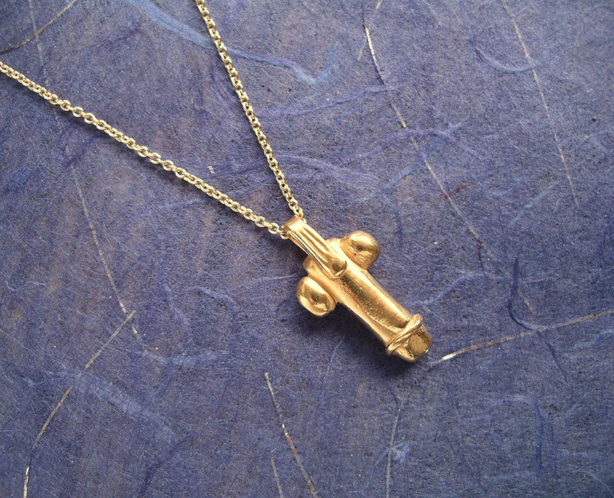A recreation of a gold Roman penis amulet A recreation of a gold Roman penis amulet