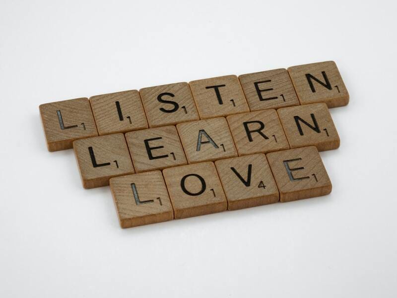 scrabble, scrabble pieces, lettering, letters, wood, scrabble tiles, white background, words, quote, letters, type, typography, design, layout, focus, bokeh, blur, photography, images, image, listen, learn, love, listen learn love, mindfulness, caring, relationship, fellowship, psychology, loving, 