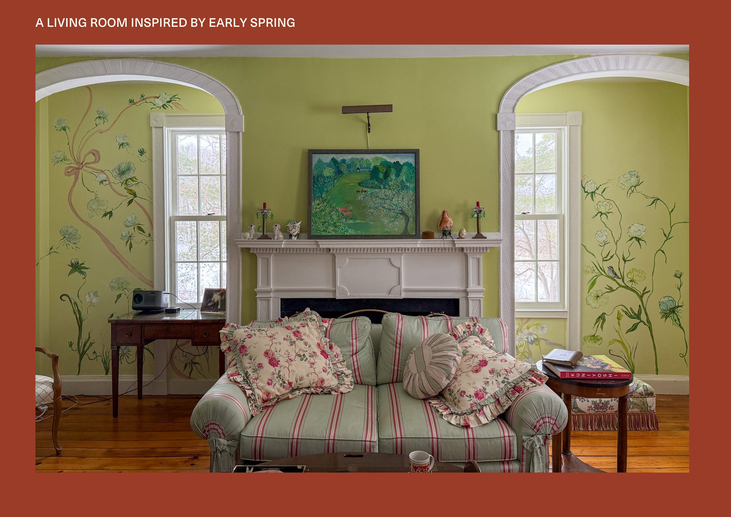 Living room with pea green walls and hand painted mural