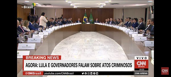 A picture of a meeting of Brazilian president, supreme court president and representatives of all Brazilian states. The title reads: Lula and Governors speak out against criminal acts. All in portugu se. Screenshot from CNN Brasil