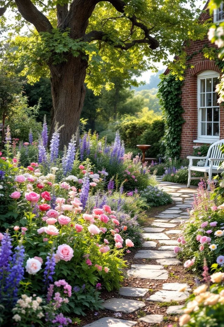 A tranquil garden path lined with lush plants and colorful flowers leading to a wooden bench.