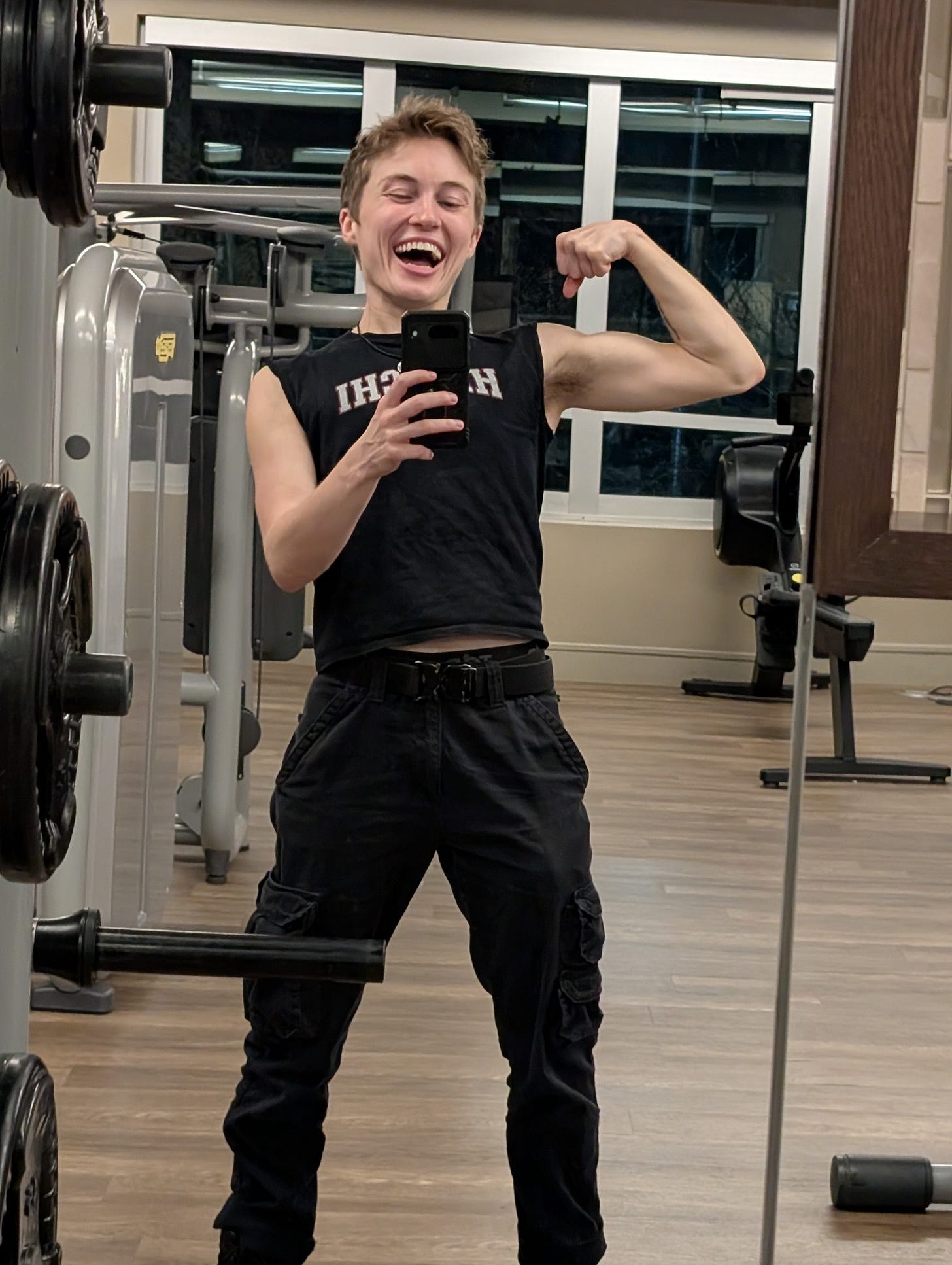 May be an image of one or more people, people bodybuilding and activewear