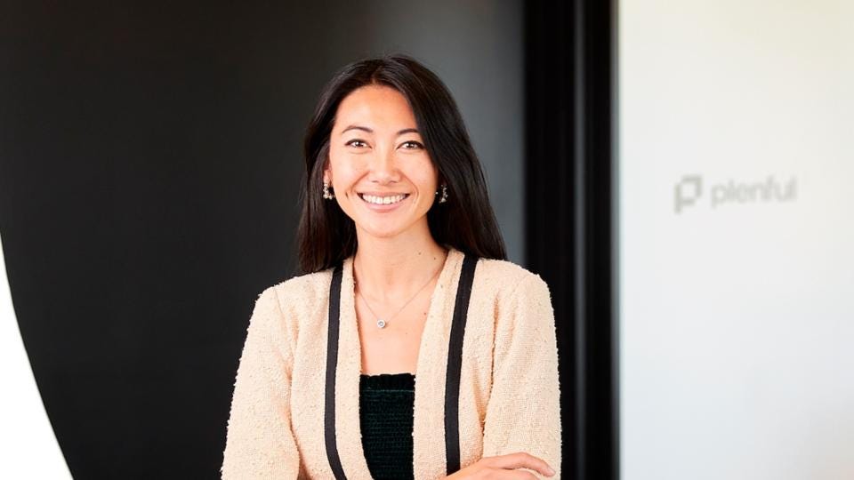 Founder & CEO Joy Liu with Logo