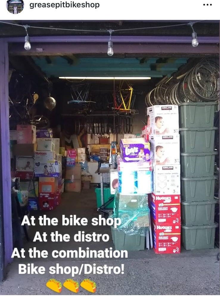 A store with boxes stacked in front of it
Description automatically generated A store with boxes stacked in front of it
Description automatically generated