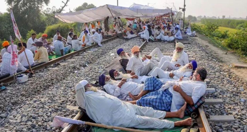 Farmers block rail tracks across Punjab Farmers block rail tracks across Punjab
