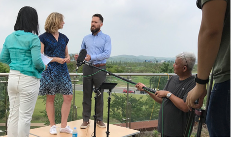 A group of people on a stage

AI-generated content may be incorrect.