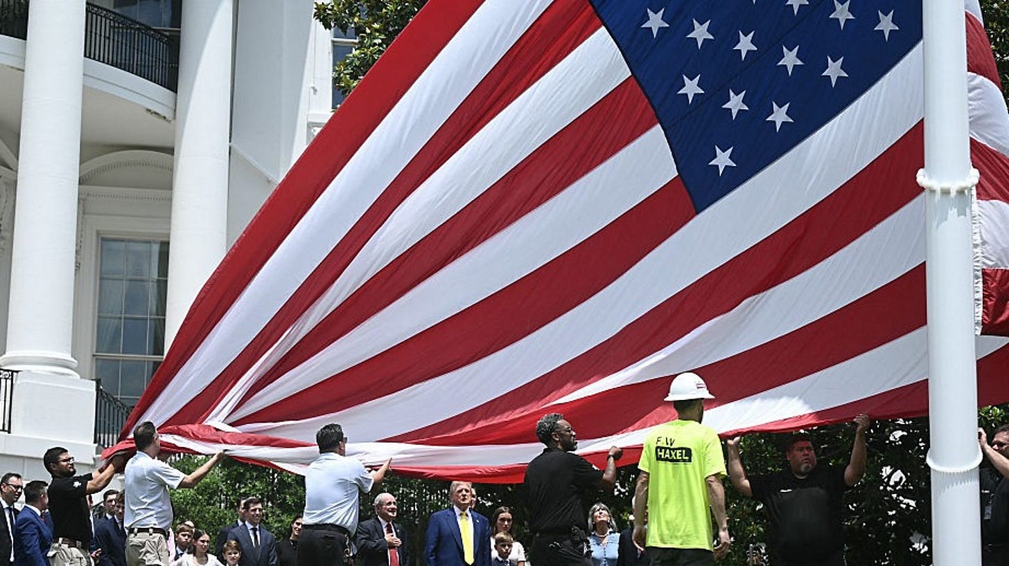 Trump installs enormous US flags at the White House