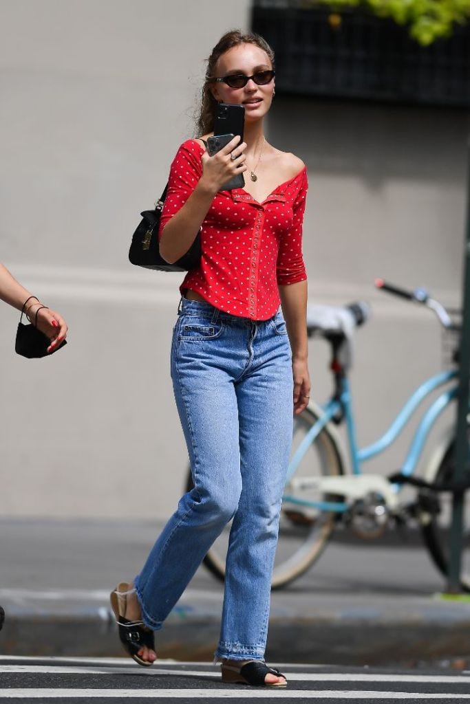 Lily-Rose Depp Perfects Street Style in a Corset Top & 'Ugly' Clogs –  Footwear News