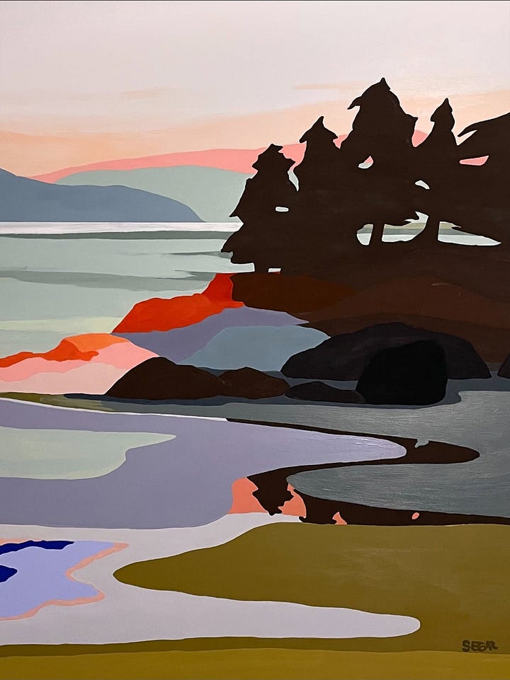First Image (Angela Seear in sunflower field): Angela Seear smiling in a sunflower field, wearing oversized sunglasses and a denim shirt, with a mountain forest in the background. Second Image A landscape painting by Angela Seear featuring abstracted silhouettes of trees on a rocky shoreline at sunset. The scene includes soft pastel hues of pink, lavender, and sage green with reflections in the water and bold blocks of earthy color in the foreground.