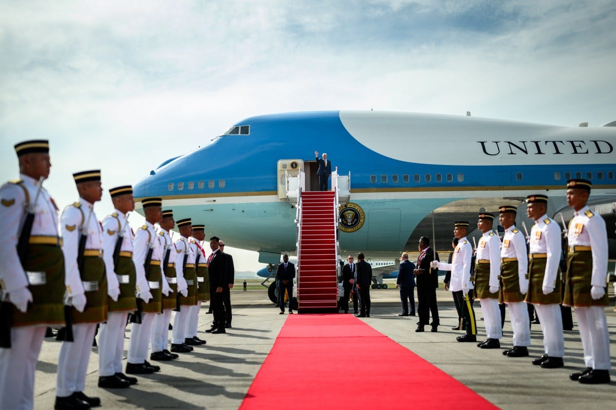 President Donald Trump bids farewell to Malaysian officials and performers gathered at Kuala Lumpur International Airport, October 27, 2025 in Kuala Lumpur, Malaysia. (Official White House Photo by Daniel Torok)