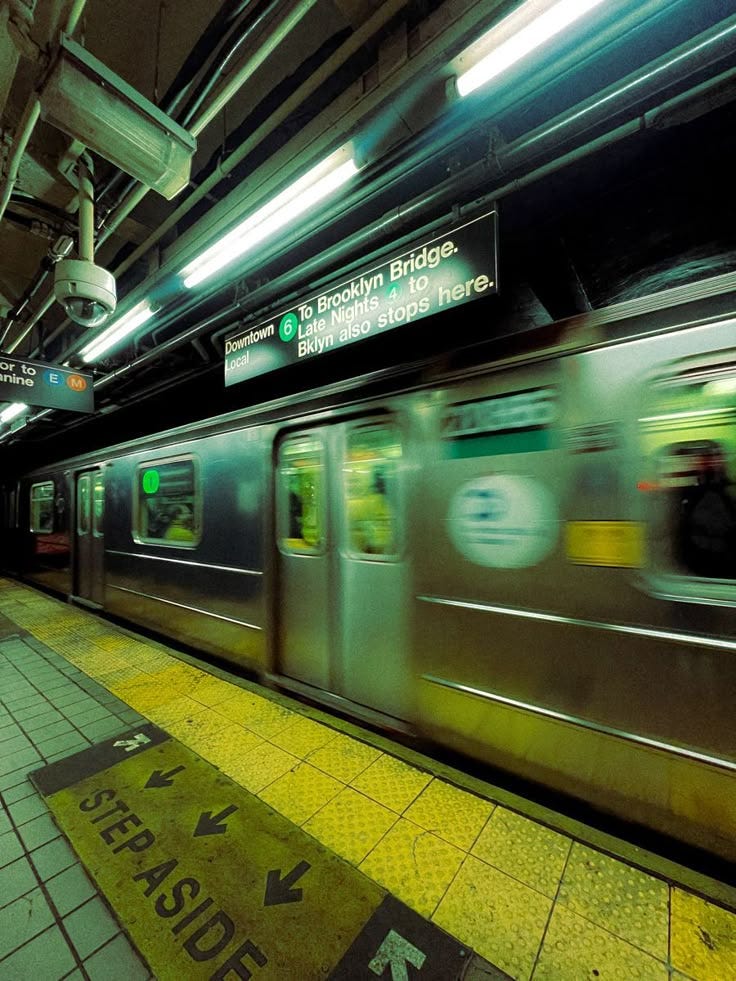 This may contain: a subway train is moving through the station