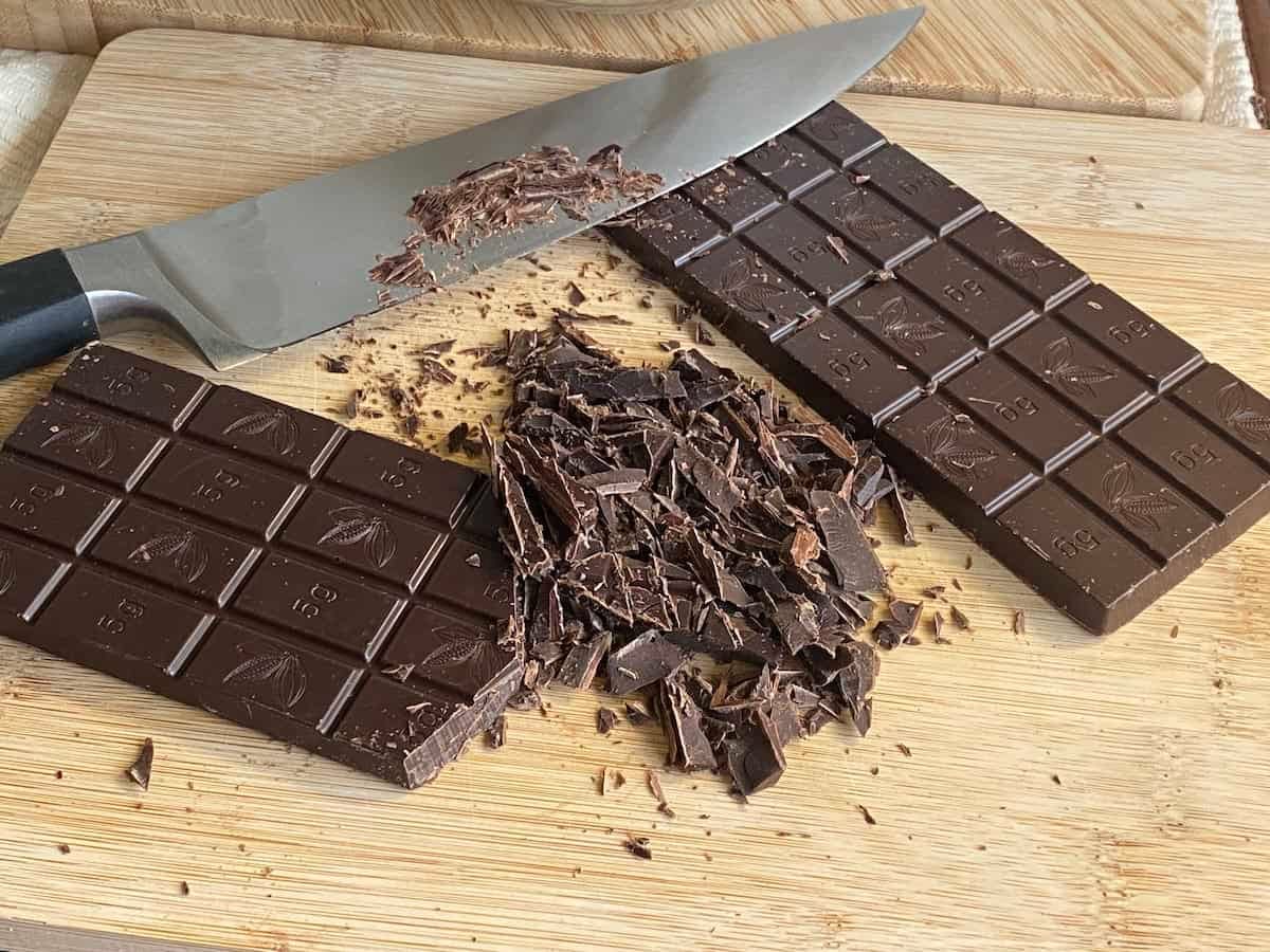 Blocks of chocolate partially chopped into chunks. Blocks of chocolate partially chopped into chunks.
