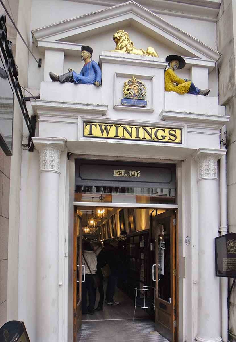 Twinings tea shop established 1707, respected purveyor of dry tea since 1717. Note the two Chinese men and the golden British lion that adorn the entrance Twinings tea shop established 1707, respected purveyor of dry tea since 1717. Note the two Chinese men and the golden British lion that adorn the entrance