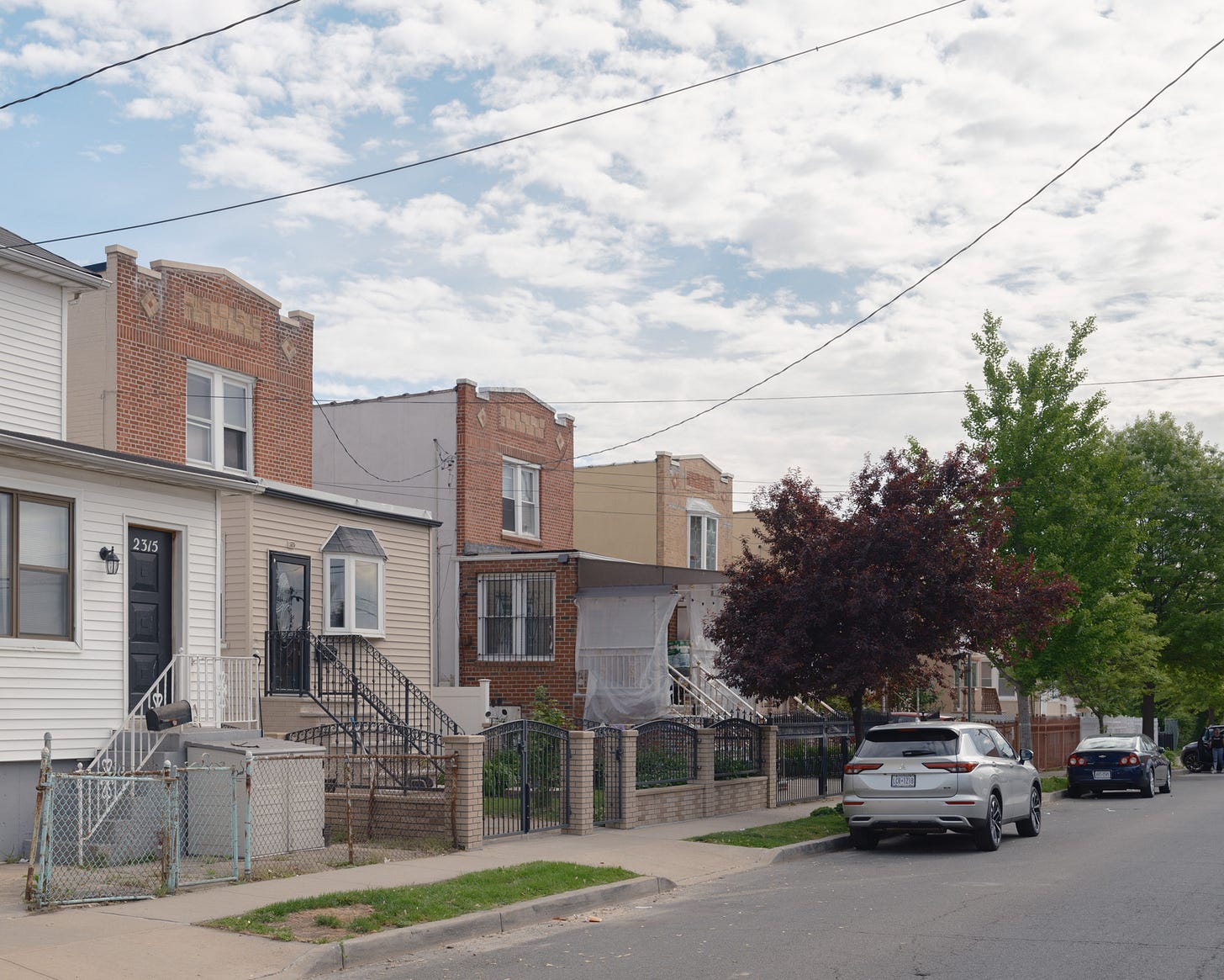 Row of houses diagonally down a street