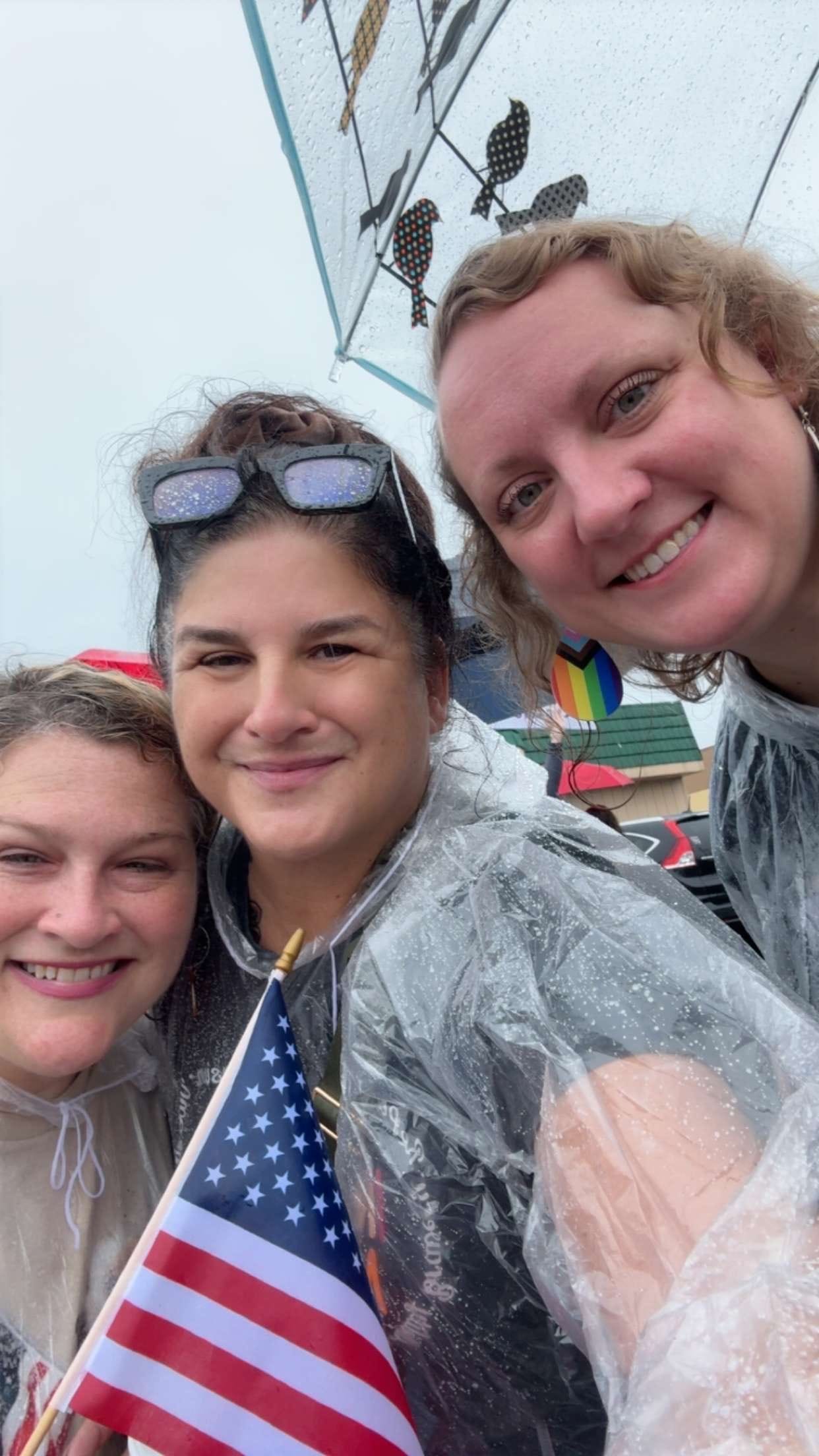 Jamie on the left with two other white women at the protest