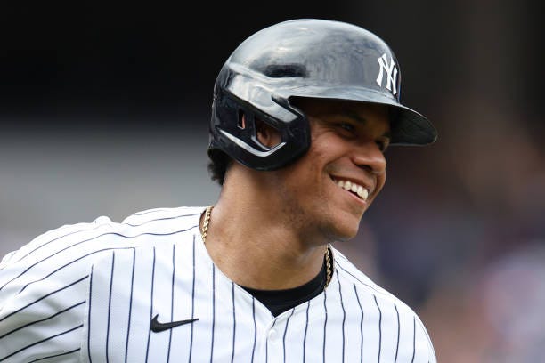 Juan Soto of the New York Yankees reacts after a two-run home run against the Cincinnati Reds during the seventh inning at Yankee Stadium on July 04,...