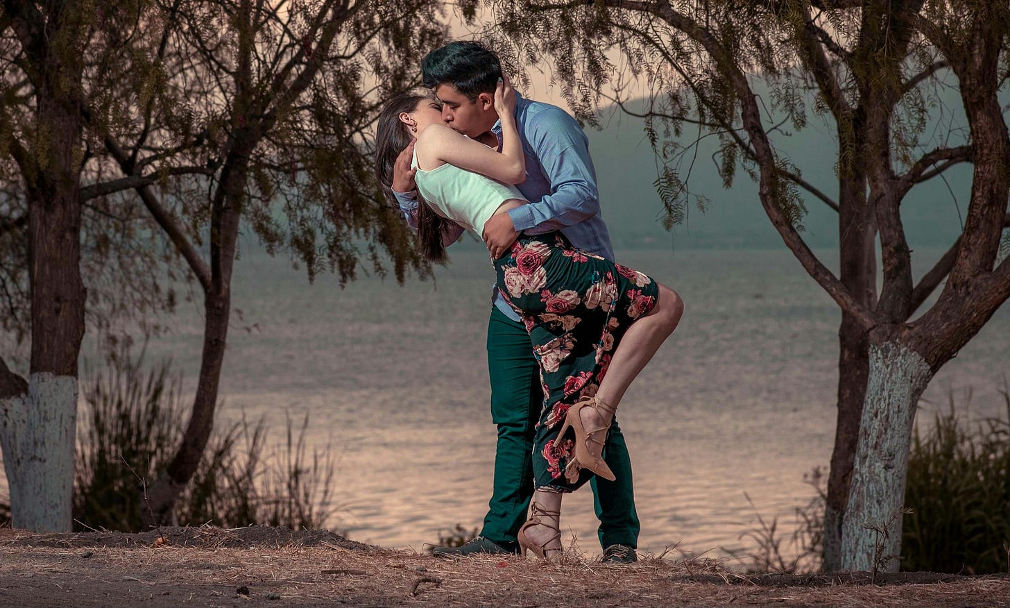 a couple in a passionate embrace