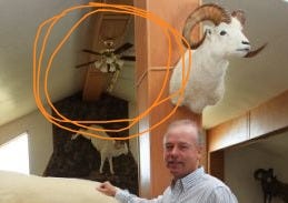 Trophy room: Rod Brandenburg poses with the polar bear he killed in the Arctic in 2006