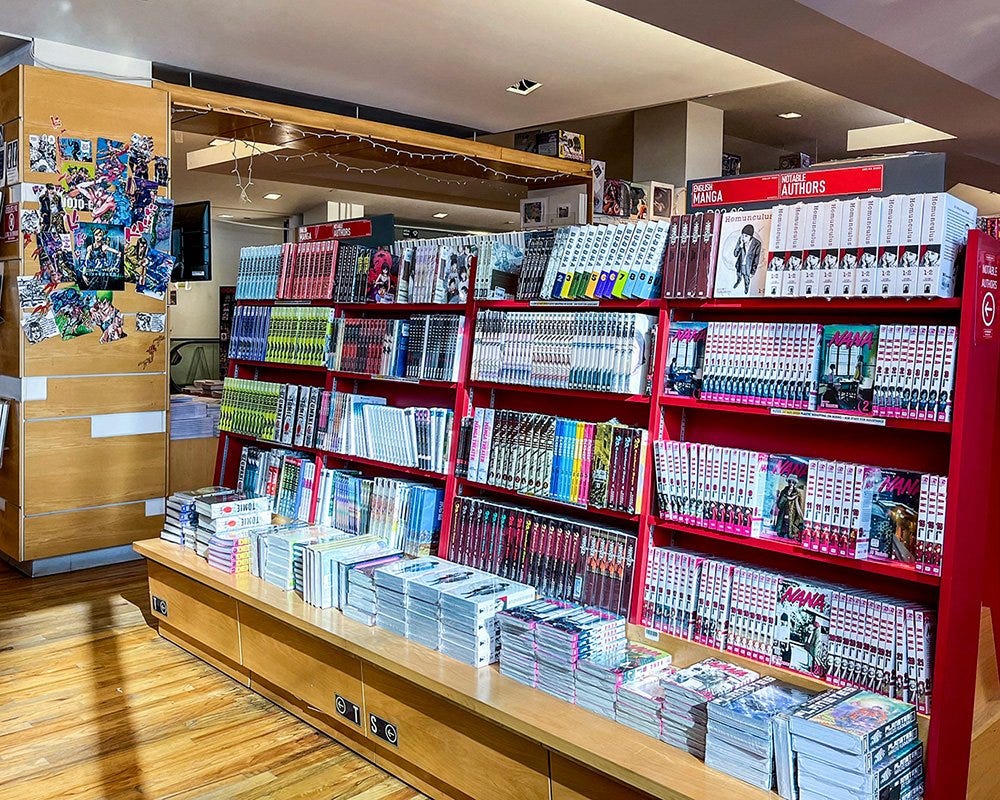  Manga on red shelves 